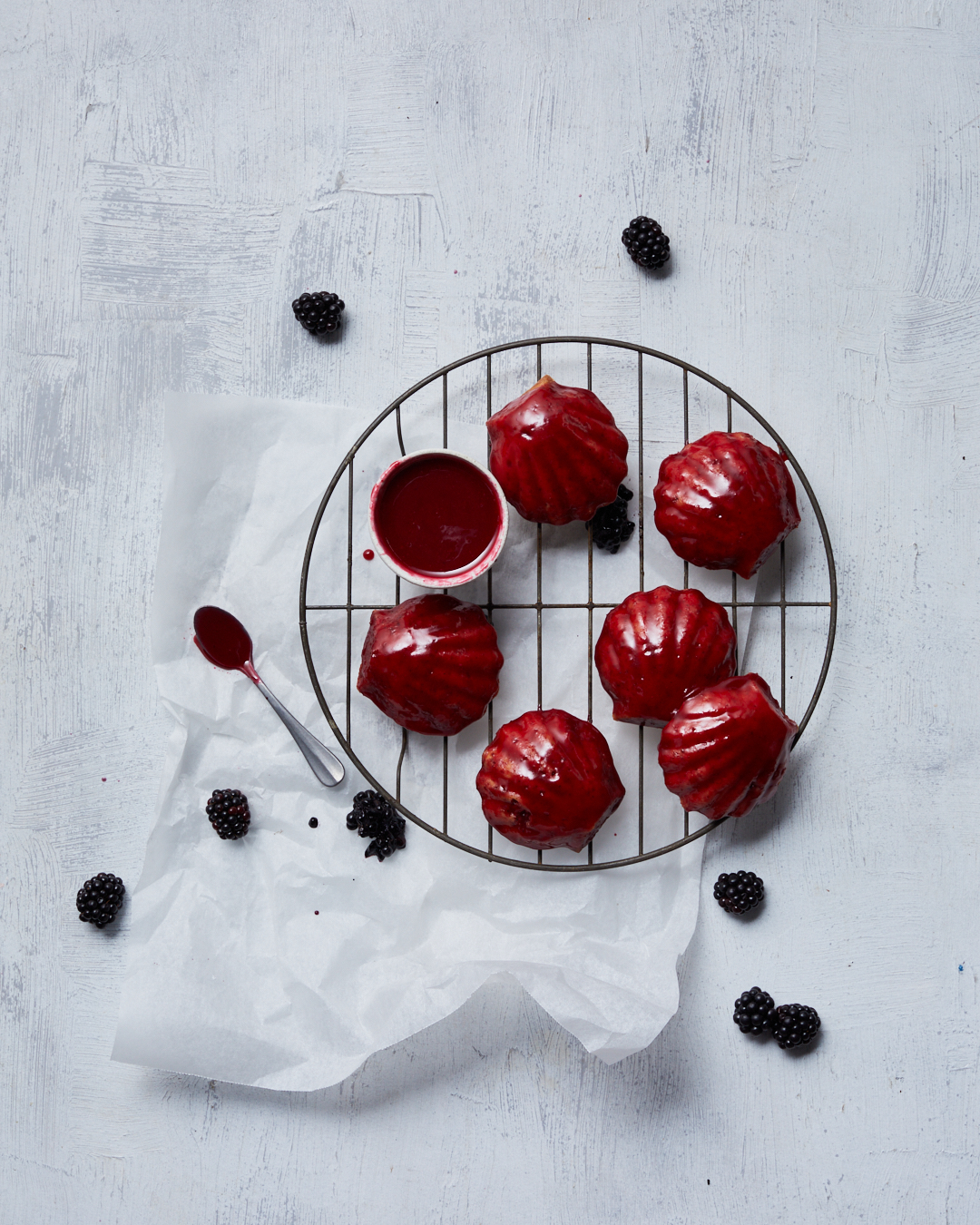 Orange Poppyseed Madeleines with Blackberry Glaze